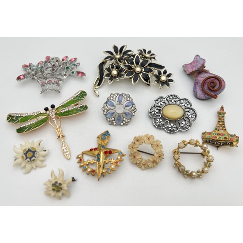 222 - 12 vintage and modern brooches, some stone set, in various sizes and designs. To include dragonfly, ... 