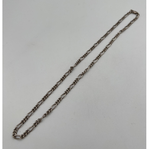 227 - An 18 inch silver Figaro style chain necklace with lobster clasp. Silver marks to fixings and clasp.... 