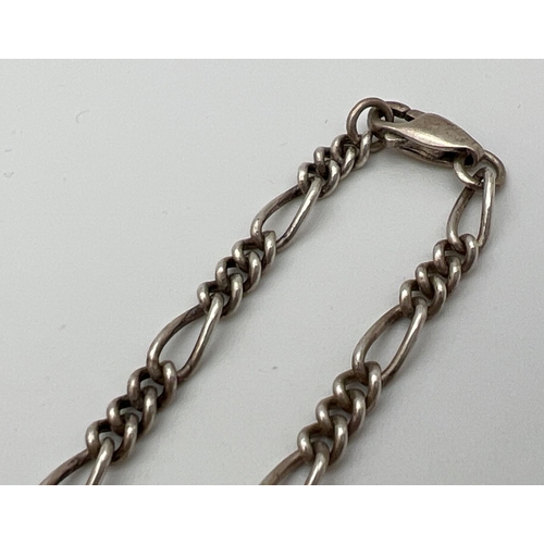 227 - An 18 inch silver Figaro style chain necklace with lobster clasp. Silver marks to fixings and clasp.... 