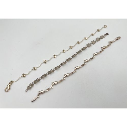 229 - 3 silver chain bracelets. A 9