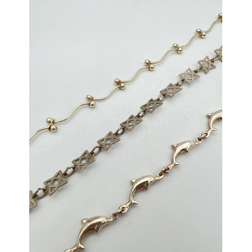 229 - 3 silver chain bracelets. A 9