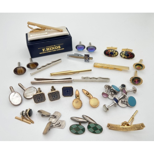 257 - A collection of vintage and modern cuff links and tie clips, to include a plain silver bar tie clip.... 