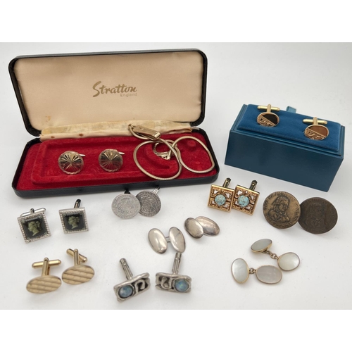 258 - A collection of vintage cuff links to include a boxed pair of gold tone engraved cuff links by F. Hi... 