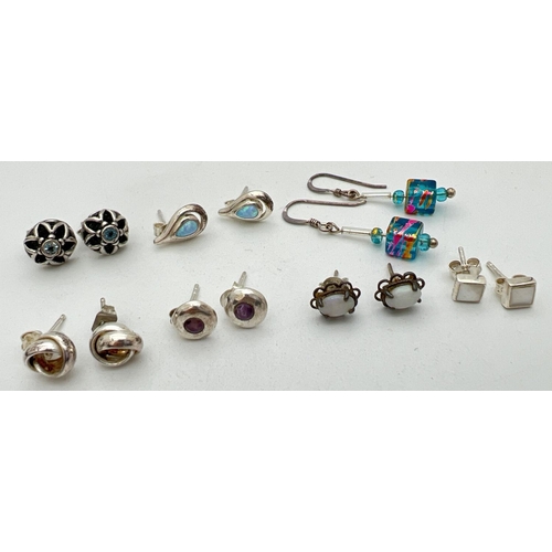 263 - 7 pairs of vintage and modern silver and white metal earrings. To include amethyst set studs, pierce... 