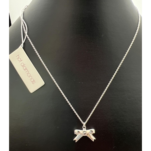 266 - A Hot Diamonds bow shaped pendant necklace, brand new with tags. Small bow set with a single diamond... 