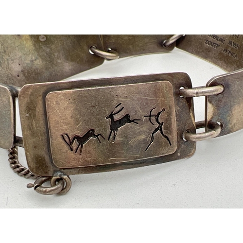 267 - A sterling silver Haglund handmade South African 7 panel bracelet with hook clasp and safety chain. ... 