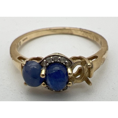 272 - A 9ct gold, sapphire and diamond dress ring. Originally set with 3 sapphire cabochon stones, 1 now m... 