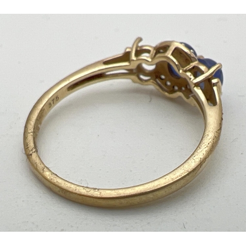 272 - A 9ct gold, sapphire and diamond dress ring. Originally set with 3 sapphire cabochon stones, 1 now m... 