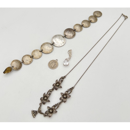 274 - A small collection of silver and white metal jewellery. To include a bracelet made from Norwegian co... 