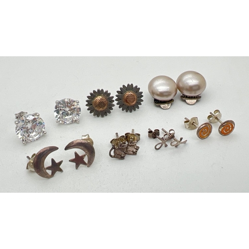 287 - 7 pairs of silver and white metal stud style earrings. To include faux pearl clip on, moon and stars... 