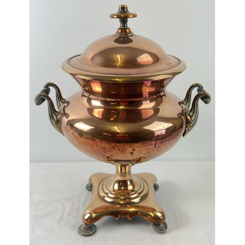 1137 - A Victorian copper samovar with stepped feet and turned wooden handles - no spigot.