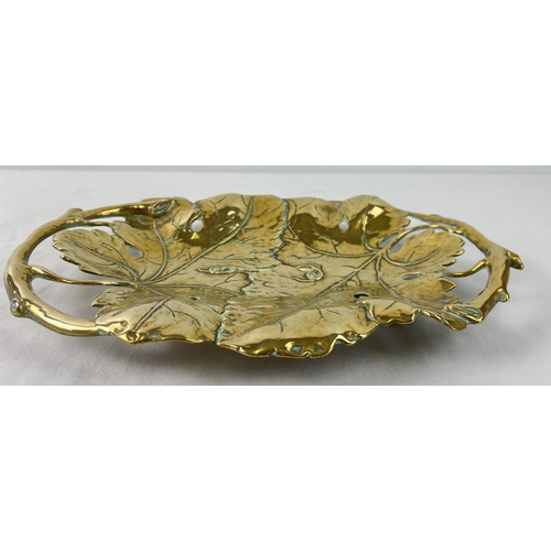 1140 - A brass Art Nouveau design shallow bowl modelled as vine leaves with pierced detail to handles. Rais... 