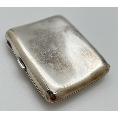 1116 - An early 20th century silver curve backed cigarette case with engraved monogram detail to front. Hal... 