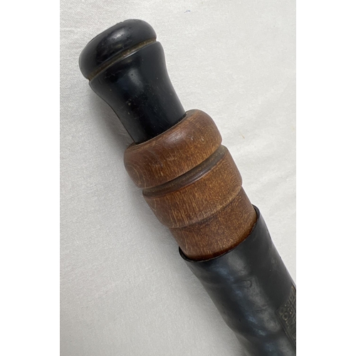 1258 - A vintage hard wood and rubber Scotch Game call, creates the feeding call for ducks when rubber is p... 