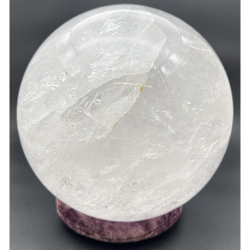 1266 - A large 15kg clear rock crystal (clear Quartz) sphere with white and rainbow colours to natural form...