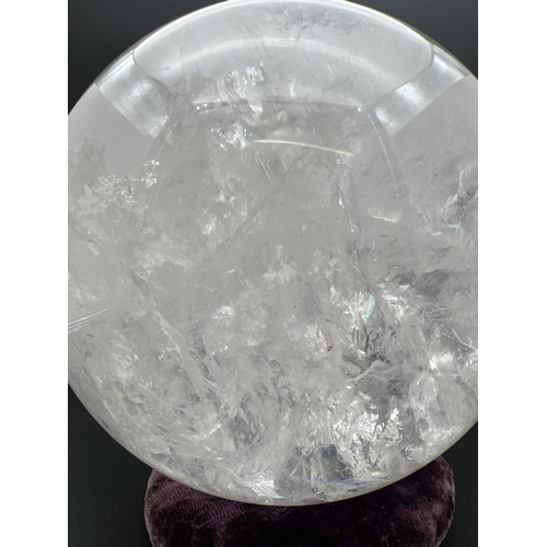 1266 - A large 15kg clear rock crystal (clear Quartz) sphere with white and rainbow colours to natural form... 