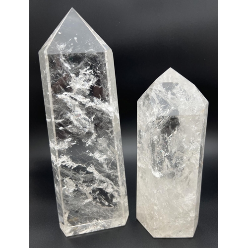 1269 - 2 large clear crystal quartz obelisk wand points with natural clear and white formations. Largest ap... 