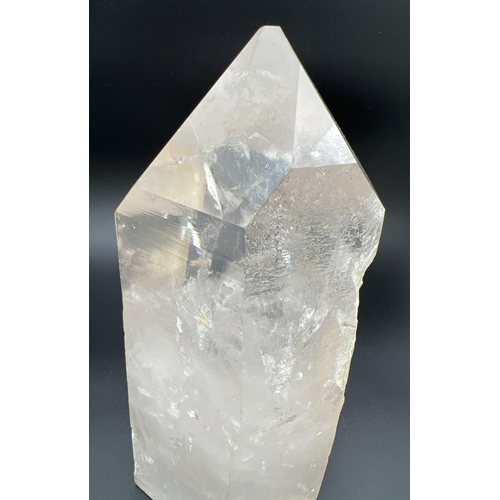 1270 - A heavy clear crystal quartz wand point with side clusters with orange/brown colour inclusions. Clea... 