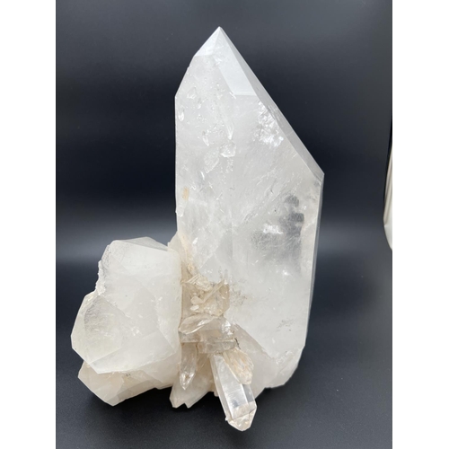 1271 - A large clear crystal quartz wand with multiple cluster detail. Natural white, black and orange colo... 