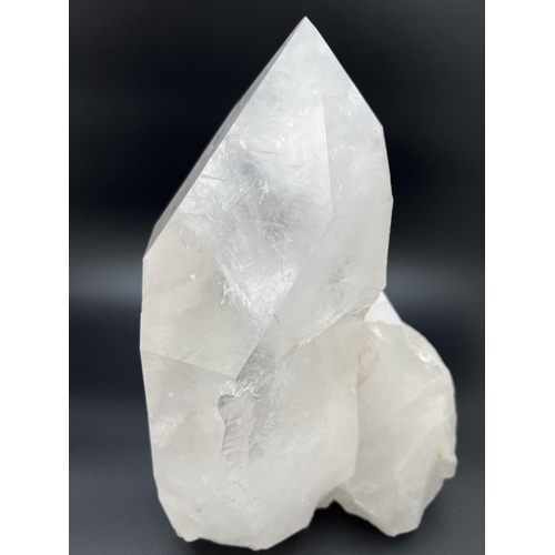 1271 - A large clear crystal quartz wand with multiple cluster detail. Natural white, black and orange colo... 