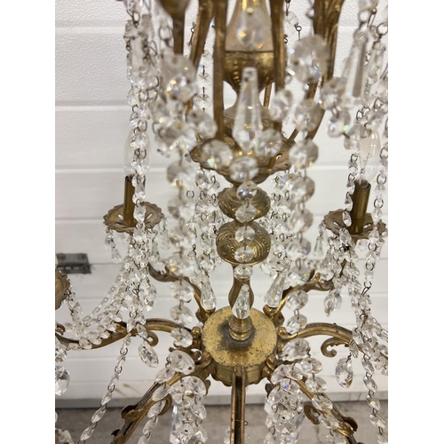 1272 - A vintage 8 arm brass and crystal chandelier ceiling pendant, with electrical wiring. Crystal drops ... 