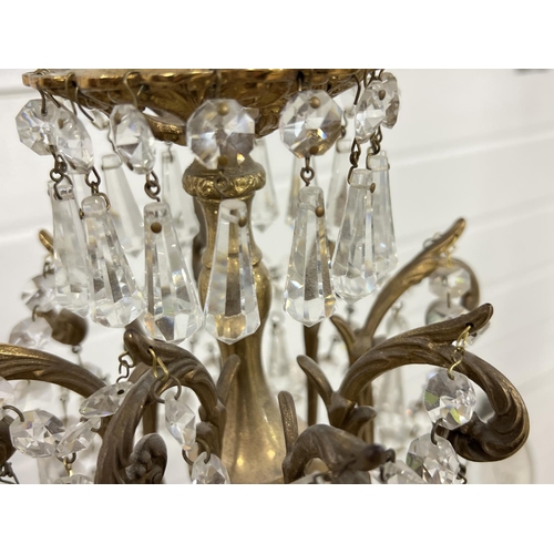 1272 - A vintage 8 arm brass and crystal chandelier ceiling pendant, with electrical wiring. Crystal drops ... 