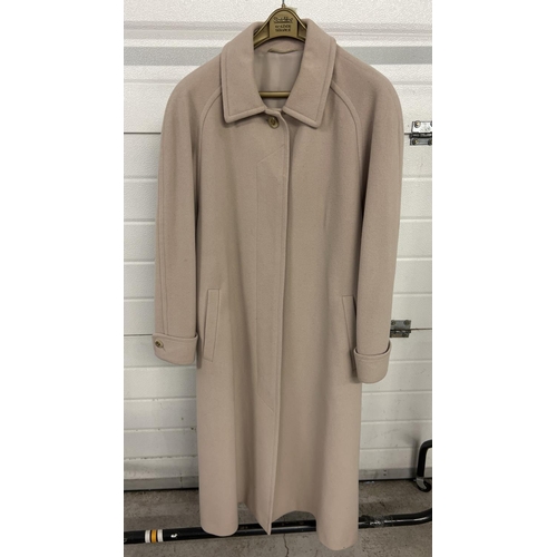 1310 - A vintage beige wool and cashmere full length coat with collar, front hidden button fastening and tu... 