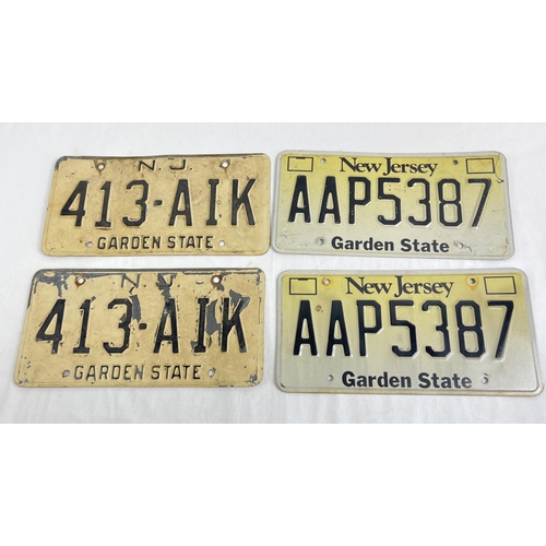 1246 - 4 assorted US metal license plates from New Jersey (The Garden State). Each approx. 30.5cm long.