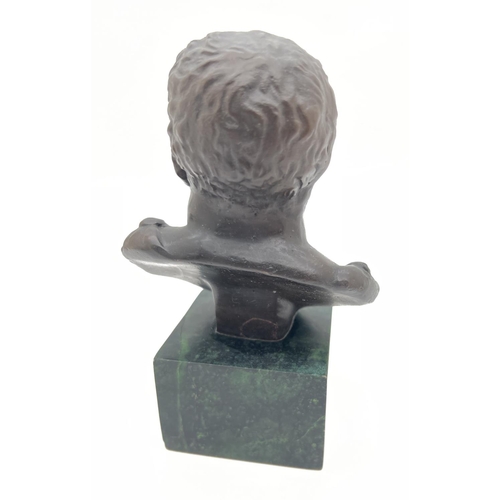 1144 - A small bronze bust mounted on a square shaped green marble base. Approx. 14cm tall.