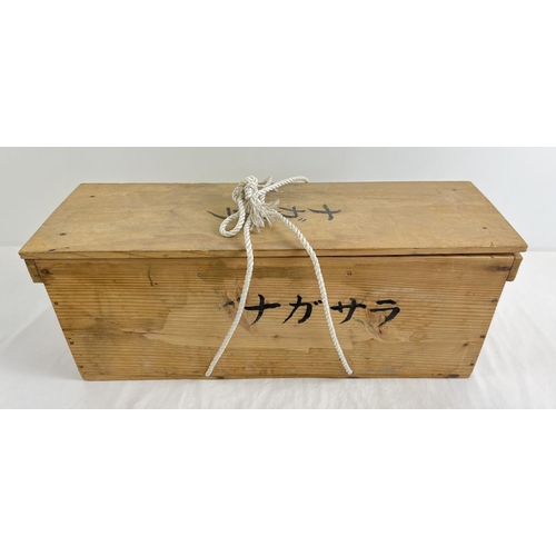 1218 - A Japanese wooden 3 sectional box with hand painted character detail to sides and lid & rope fasteni... 