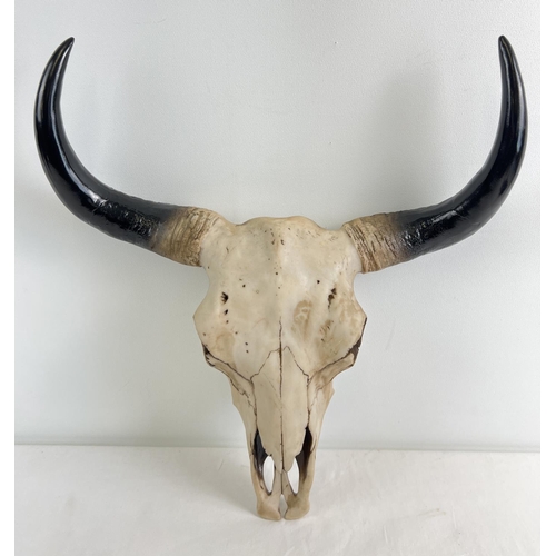 1277 - A large modern resin wall mountable ornament of a buffalo skull and horns. With metal fixing plate t... 