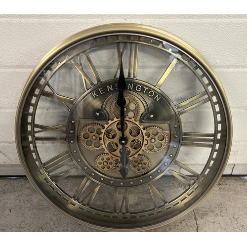 1156 - A very large modern brushed bronzed metal wall clock with glass face, roman numeral markers & cog de... 