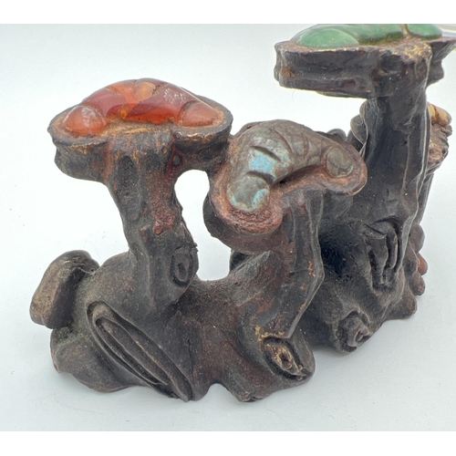 1220 - A Chinese bronze Scholars rock modelled as a cluster of mushrooms, set with natural stone panels. Ap... 