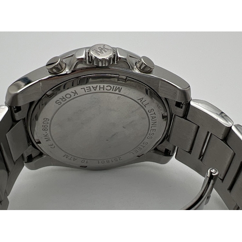 A men s chronograph wristwatch by Michael Kors MK 8609. Stainless steel strap and case with gunmet