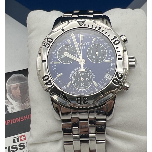 1107 - A boxed Tissot T362/462K chronograph wrist watch. Stainless steel case and strap with blue face and ... 