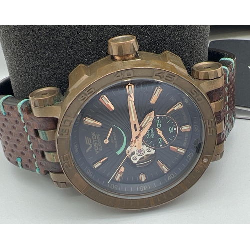 1108 - A boxed Vostok Europe Energia Rocket 0157/3000 chronograph automatic wristwatch. Black face with ros... 