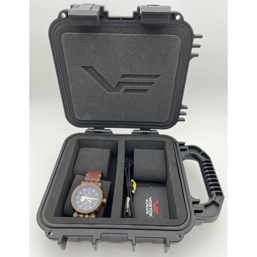 1108 - A boxed Vostok Europe Energia Rocket 0157/3000 chronograph automatic wristwatch. Black face with ros... 