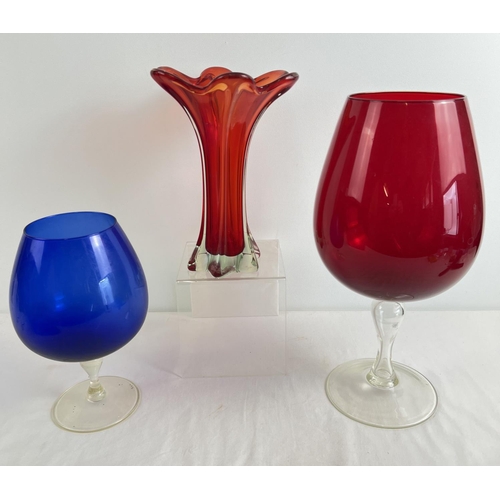 1190 - 3 large pieces of mid century coloured glass. 2 oversized brandy snifters in red and blue coloured g... 