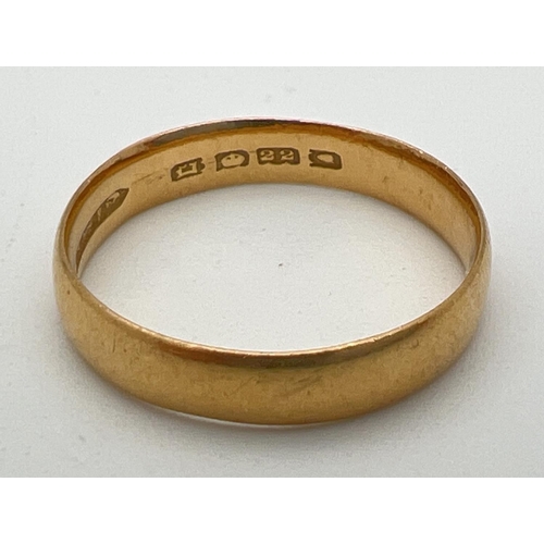 1038 - A 22ct gold plain 4mm wedding band. Weight approx. 2.8g. Ring size N½.