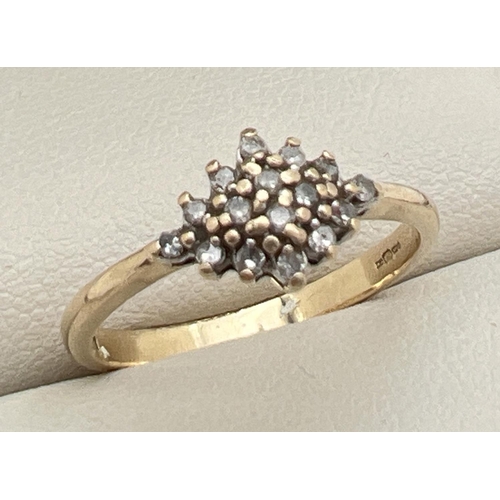 1039 - A 9ct gold 0.15ct diamond cluster style ring, hallmarked inside band. Ring size O. Total weight appr... 