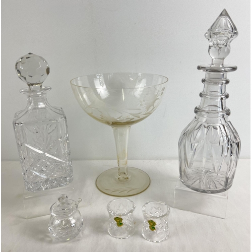 1191 - A collection of vintage glass and crystal items to include 2 decanters. Lot also includes etched ove... 