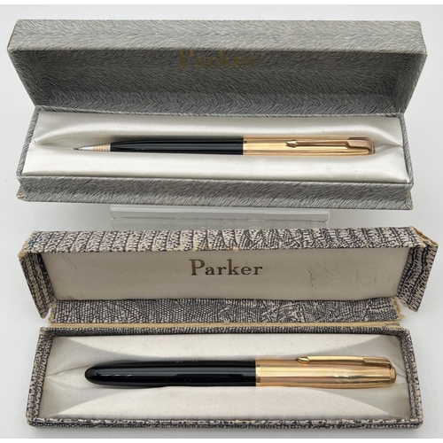 1135 - A vintage Parker 51 fountain pen together with a Parker mechanical pencil. Both with black Case and ... 