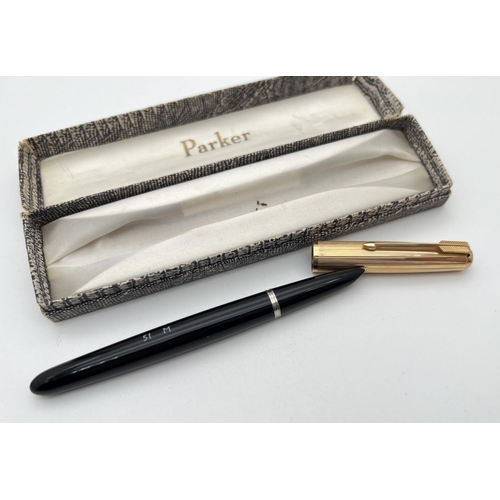 1135 - A vintage Parker 51 fountain pen together with a Parker mechanical pencil. Both with black Case and ... 