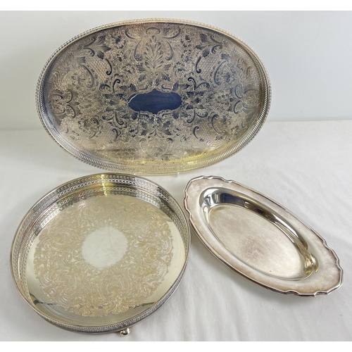 1128 - 3 silver plated trays to include 2 galleried trays with scroll & foliate design on ball feet. Larges... 