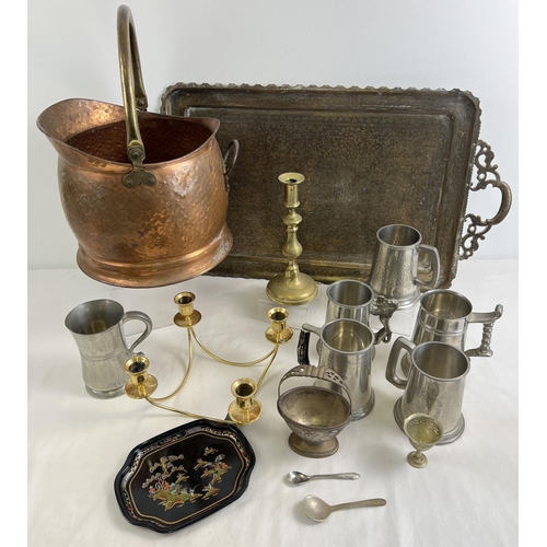 1145 - A quantity of assorted vintage metal ware items. To include large ethnic tray, pewter tankards and c... 