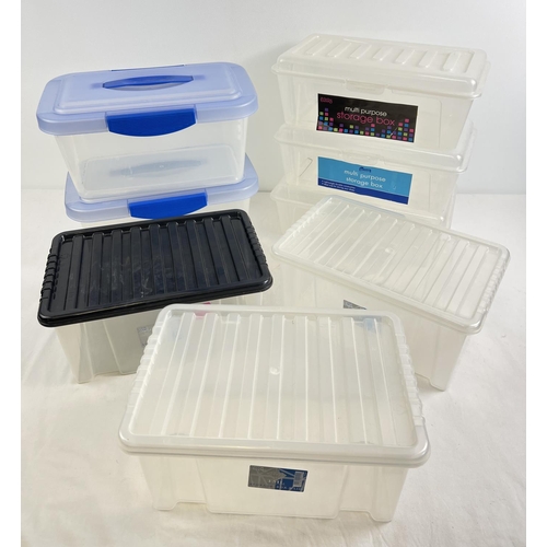 1286 - 8 small lidded plastic tubs - approx. 8 litres. 3 with hinged lids, 3 with snap on lids and 2 with c... 