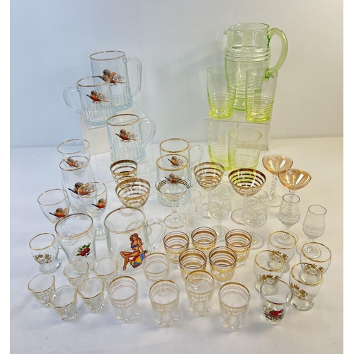 1205 - A box of assorted mid century glass ware to include transfer printed glasses and gilt striped glasse... 