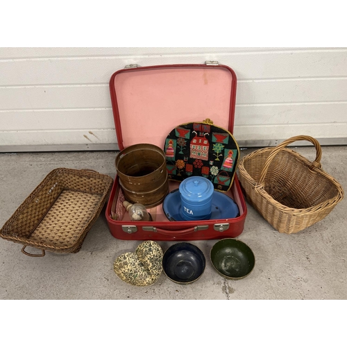 1297 - A vintage suitcase containing a selection of vintage misc items. To include enamel ware, papier mach... 