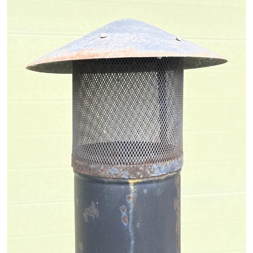 1480 - A large garden chiminea raised on tripod feet of scroll design. With repair made near door hinge. Ap... 