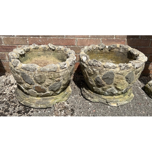 1481 - A large & heavy pair of staone & concrete garden planters with stepped design base. Approx. 34cm tal... 